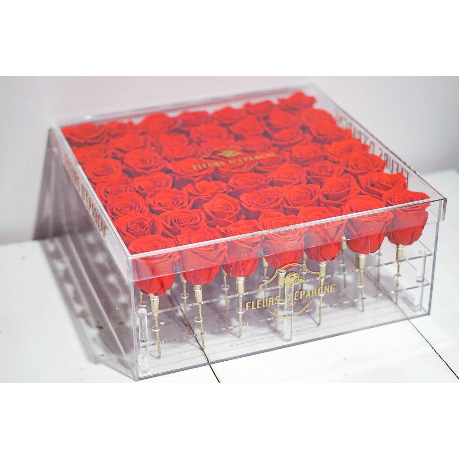 Our 49 Rose Crystal Box comes in a luxurious, crystal-clear acrylic material arranged with double the amount of our Original Crystal Box